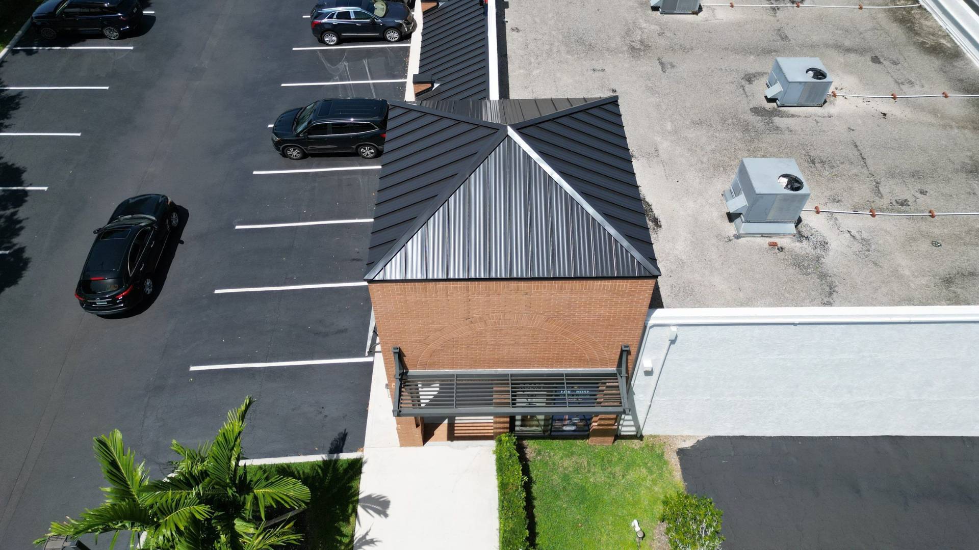 Coconut Cay Shopping Center metal roofing pitch